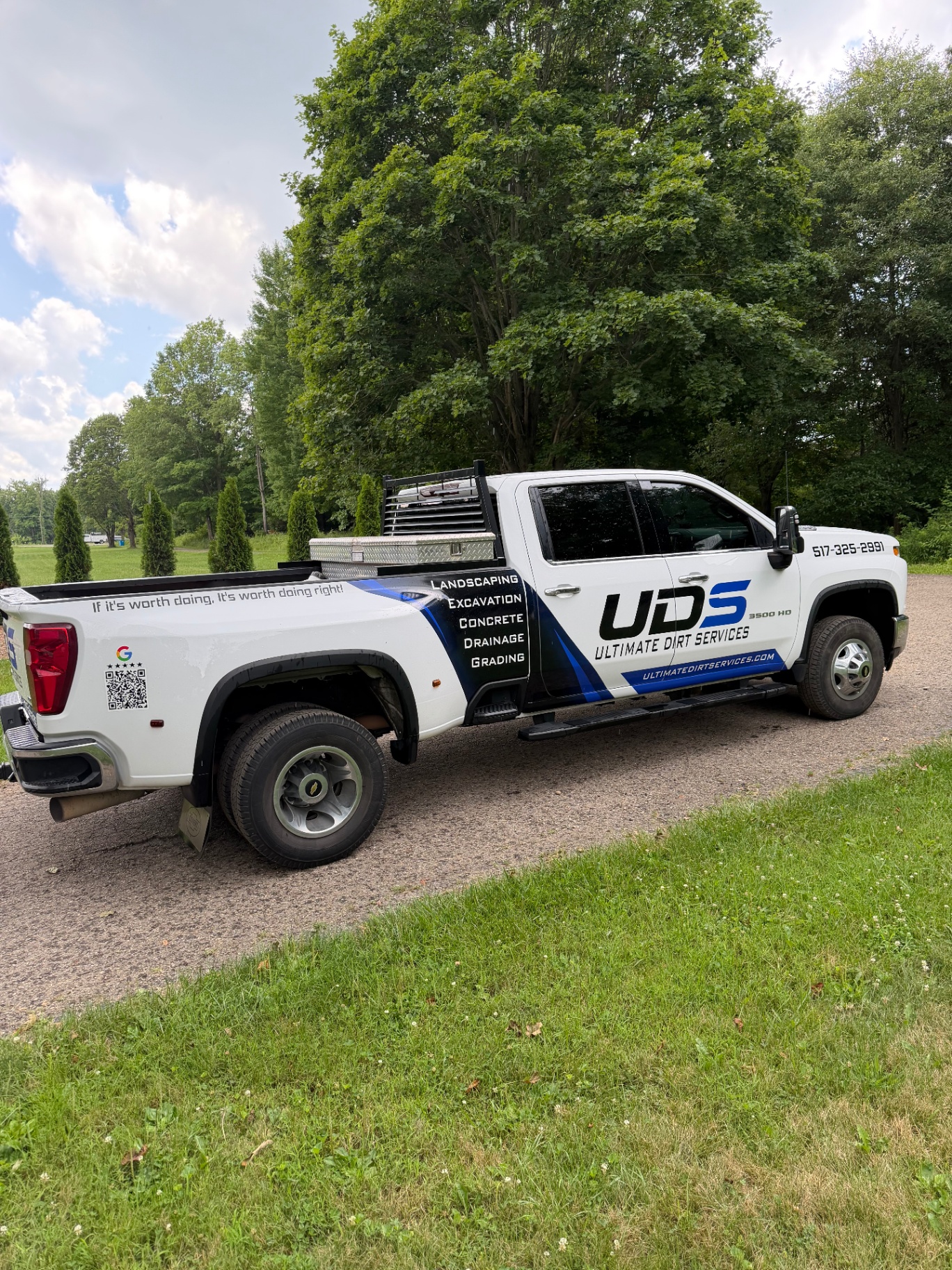 Ultimate Dirt Services truck and equipment on a Jackson County job site